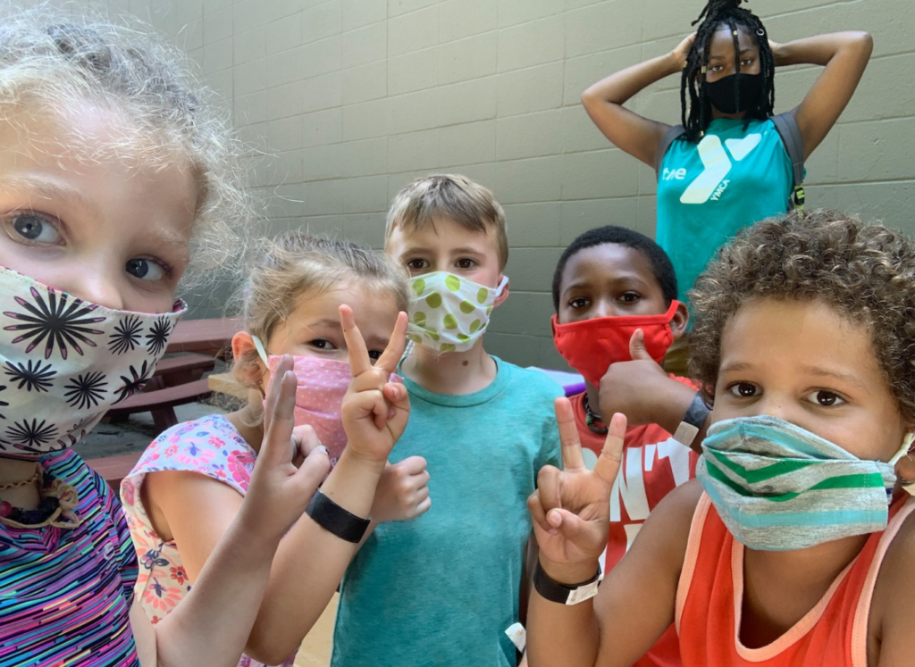children wearing masks