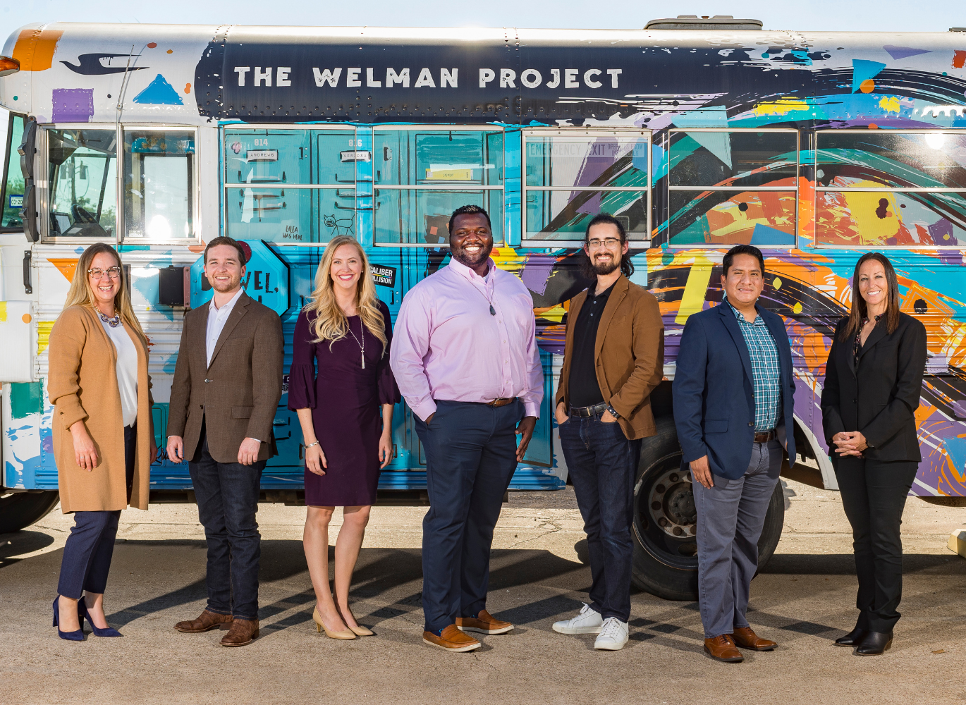 Photo of WORTH supporters standing in front of The Welman Project bus